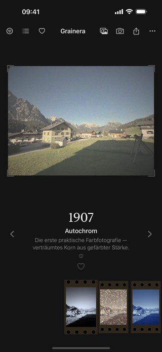 Grainera screenshot: the village in soft, dreamy autochrome color with visible grain, labelled 1907.