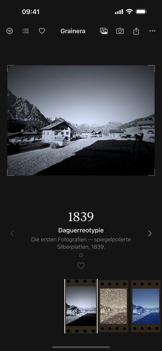Grainera screenshot: the same village as a sharp black-and-white daguerreotype on a mirror-bright plate, labelled 1839.
